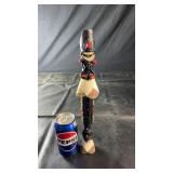 Decorative recorder flute featuring a carved