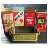 Assorted vintage metal tins including Nabisco