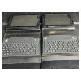 Two tablet keyboard cases with built-in