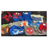 Assorted childrenï¿½s clothing lot featuring a mix