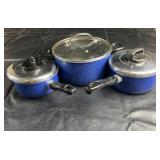 T-fal cookware set including three blue pots w