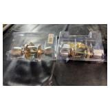 Pair of door knob locksets in original packaging,