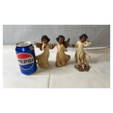 Set of three decorative angel figurines with