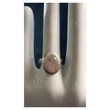 Stamped sterling silver ring featuring an oval