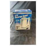 Pit Stop 12-Volt Beverage Heater in original box.