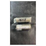 Two rolls of Canadian 25-cent Millennium