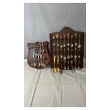 Collection of vintage souvenir spoons displayed