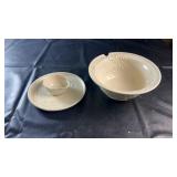 Decorative cream-colored ceramic serving pieces