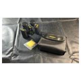 Bushnell binoculars with carrying case. Includes