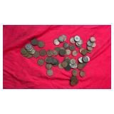 Collection of Canadian one-cent pennies in mixed