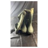 Pair of green hip waders with integrated rubber