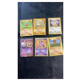 Pokémon trading card collection featuring six