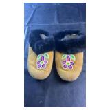 Pair of handcrafted moccasin-style slippers by
