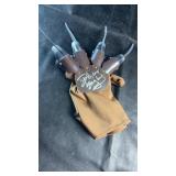Freddy Krueger-style glove replica featuring four
