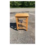 Wooden kitchen cart or utility island featuring a