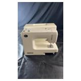 Kenmore sewing machine with carrying case.