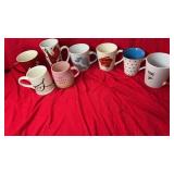 Collection of eight novelty and promotional mugs
