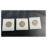 Three Canadian 25-cent pieces dated 1939, 1942,