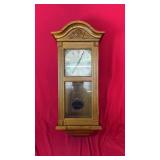 Wood-finish Ergo wall clock with a classic Roman