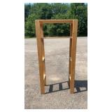 Tall solid wood display shelf with open sides and