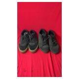 Two pairs of black casual sneakers: one pair of
