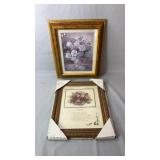 Pair of framed floral prints, including a vase of