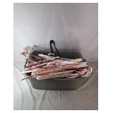Storage Bin of Clothes HangersGrey storage bin