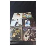 Mixed vinyl record albums by various artists.