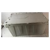 Gray folding top storage bin containing a variety