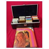 Vintage collection of 8-track tapes in a storage