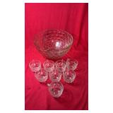 Clear thumbprint glass punch bowl with a textured