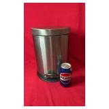 Stainless steel step-on waste bin with foot pedal