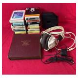 A collection of vintage 8-track tapes, a 45 RPM