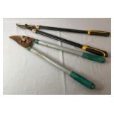 Pair of long-handled pruning loppers, including