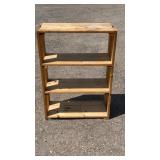 Wooden 3-tier shelving unit with an open design,