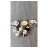 Collection of mixed floral teacups and matching