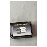 30x21mm jewelerï¿½s loupe in the original box.
