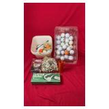 A quantity of golf balls, wooden and plastic