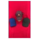 Three baseball caps including a bilingual