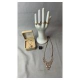 Collection of costume jewelry including rings,