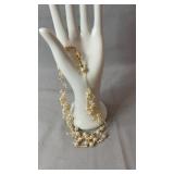 Decorative multi-strand faux pearl necklace