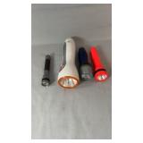 Collection of four flashlights in assorted sizes