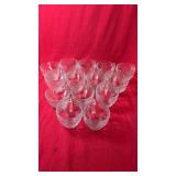Set of 14 clear glass handled cups featuring an