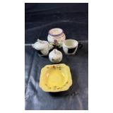 Decorative ceramic collection featuring an Arcosy