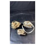 Three household extension cords in various
