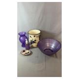 Purple-themed home décor including a large