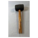 Heavy-duty black rubber mallet with a wooden
