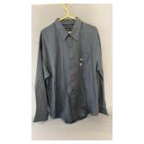 Blue Van Heusen long sleeve dress shirt with a