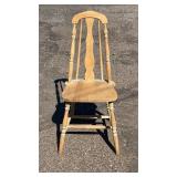 Solid wood chair with a classic spindle back