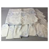 White tablecloth with light blue embroidered